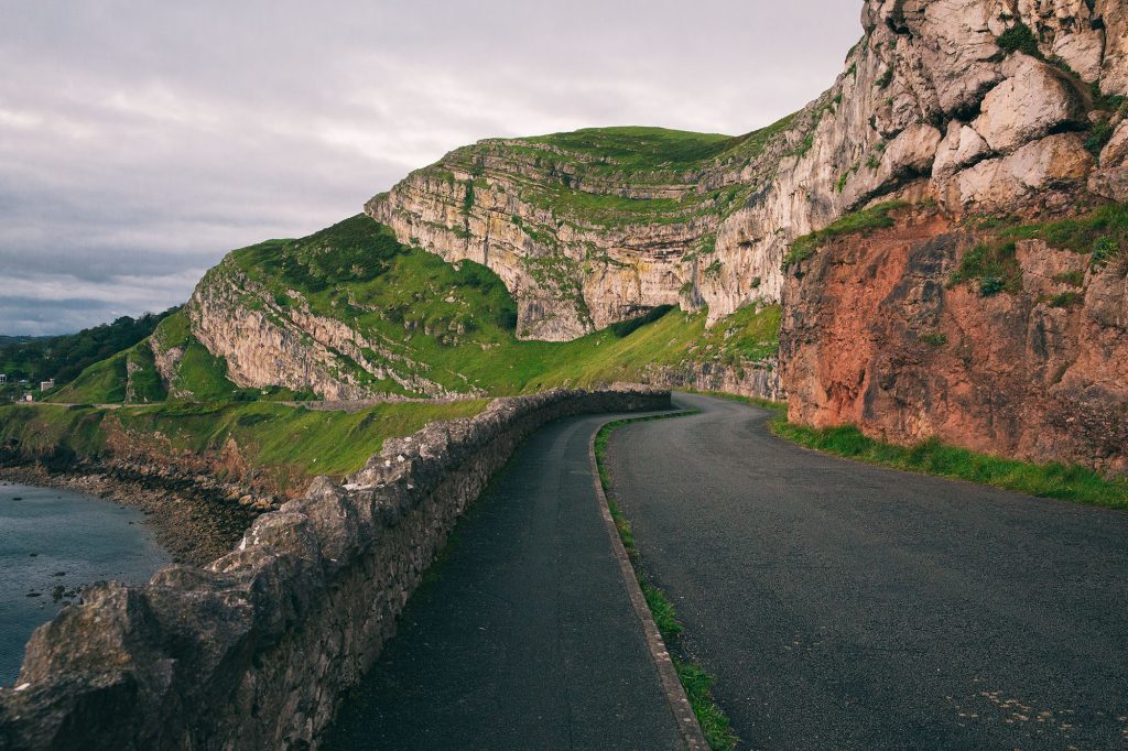 Image is of Marine Drive with the Great Orme in the background.